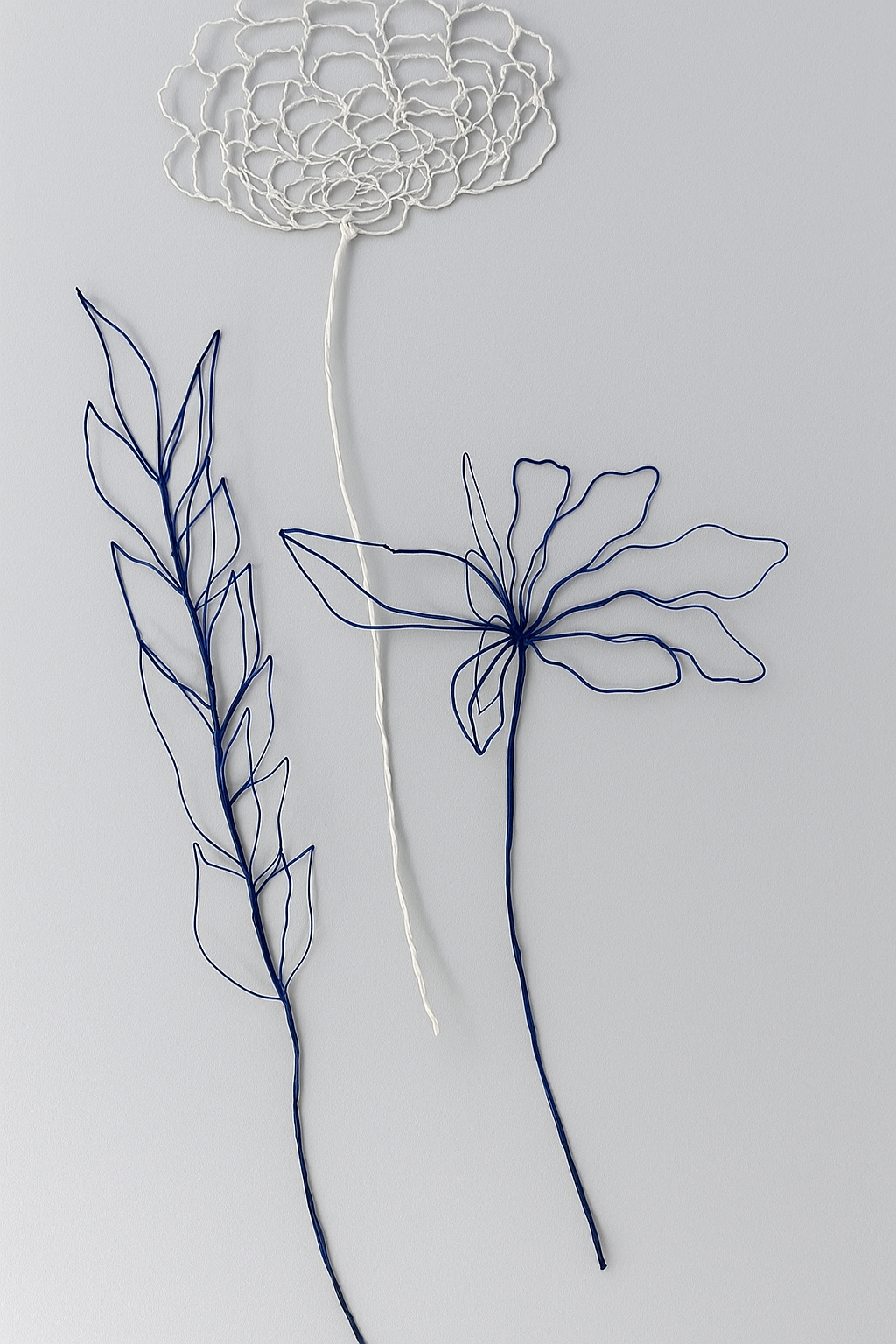Blue leaves + white flower + blue flower